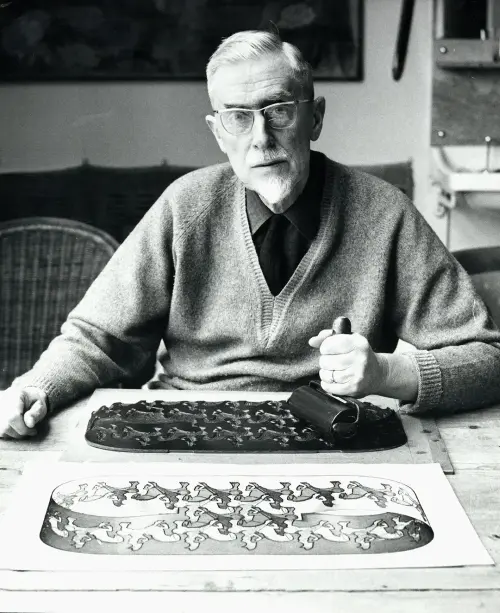Escher working on printing Horseman. Escher working on printing Horseman.